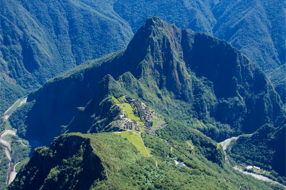 A view from Machu Picchu Mountain towards the citadel, Huayna Picchu and the Urubamba valley