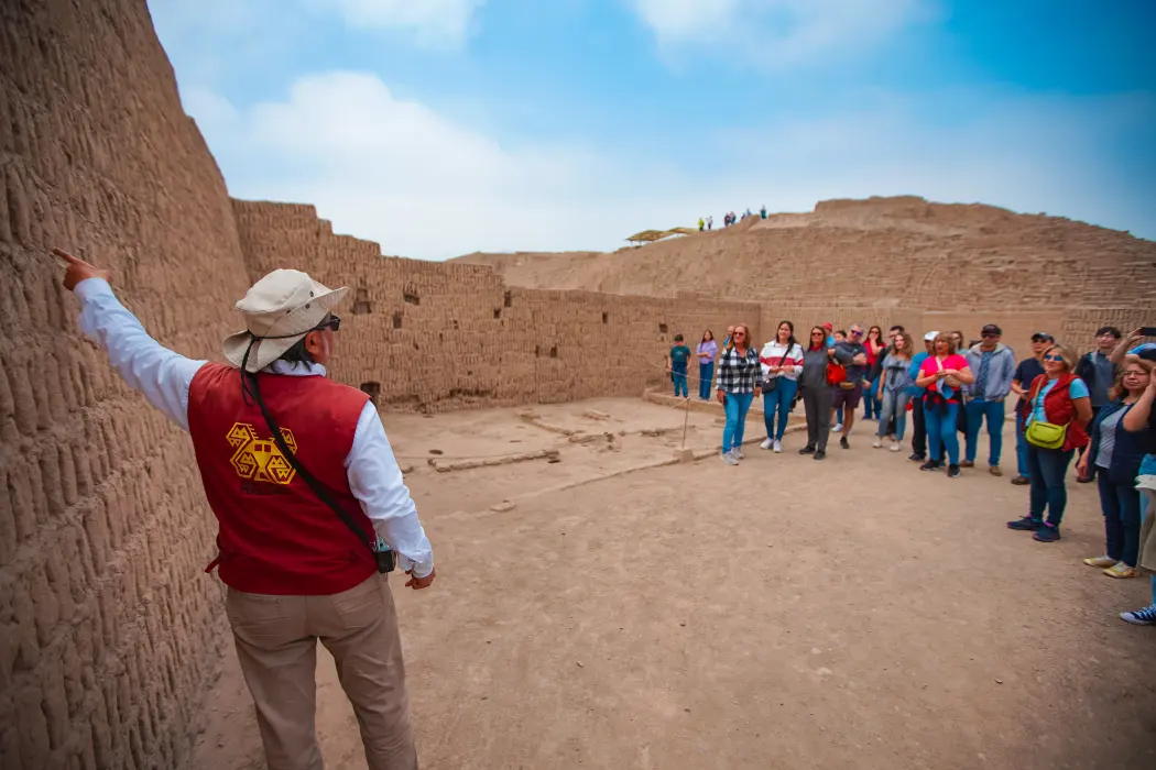 A guided group in the adobe archaeological site of Huaca Pucllana