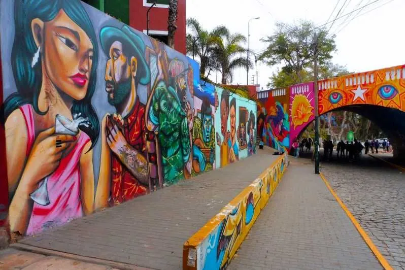 Colourful murals beside a pedestrian passage in Barranco