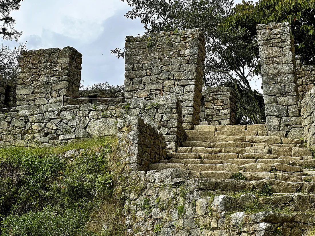 Stone steps and gateway remains at the real Intipunku above Machu Picchu