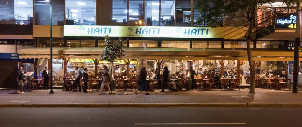 The signed facade and terrace of Haití on Diagonal