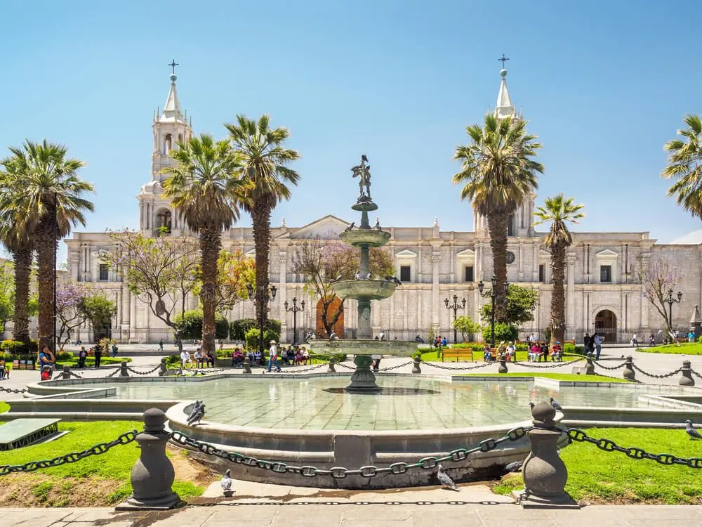 The cathedral and fountain seen from the Plaza de Armas
