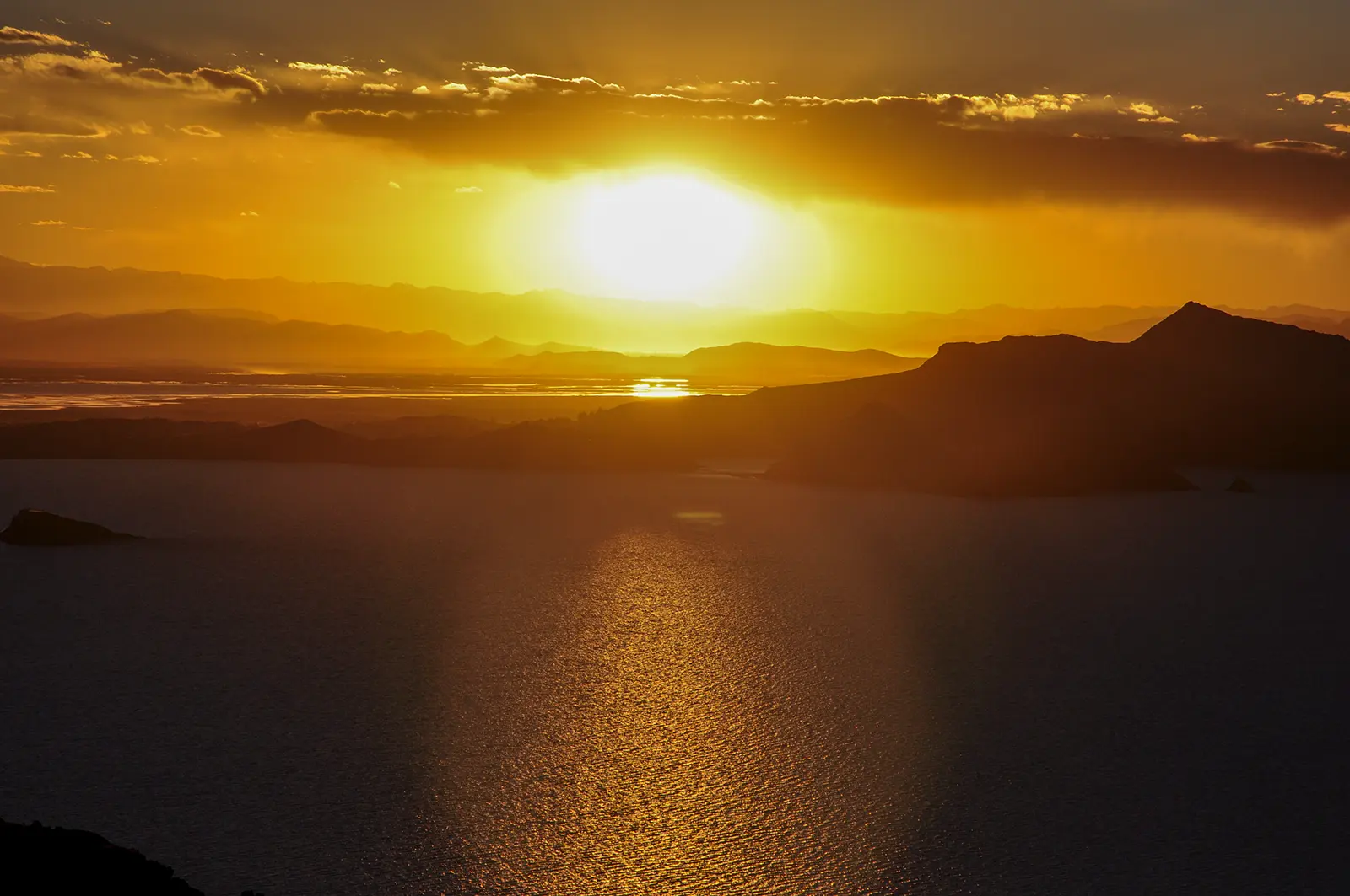 Golden sunset seen from Amantaní over Lake Titicaca