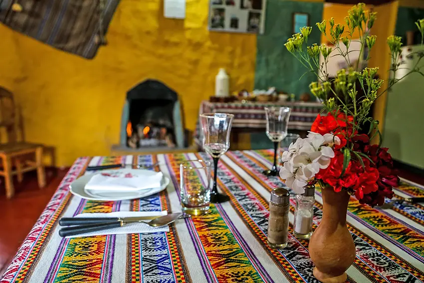 The prepared family table at Casa Bella Flor in Yanque
