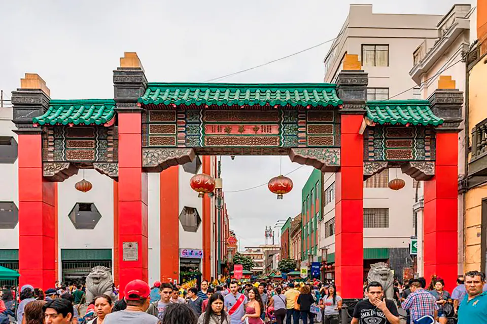 The gateway and street scene of Lima’s Barrio Chino